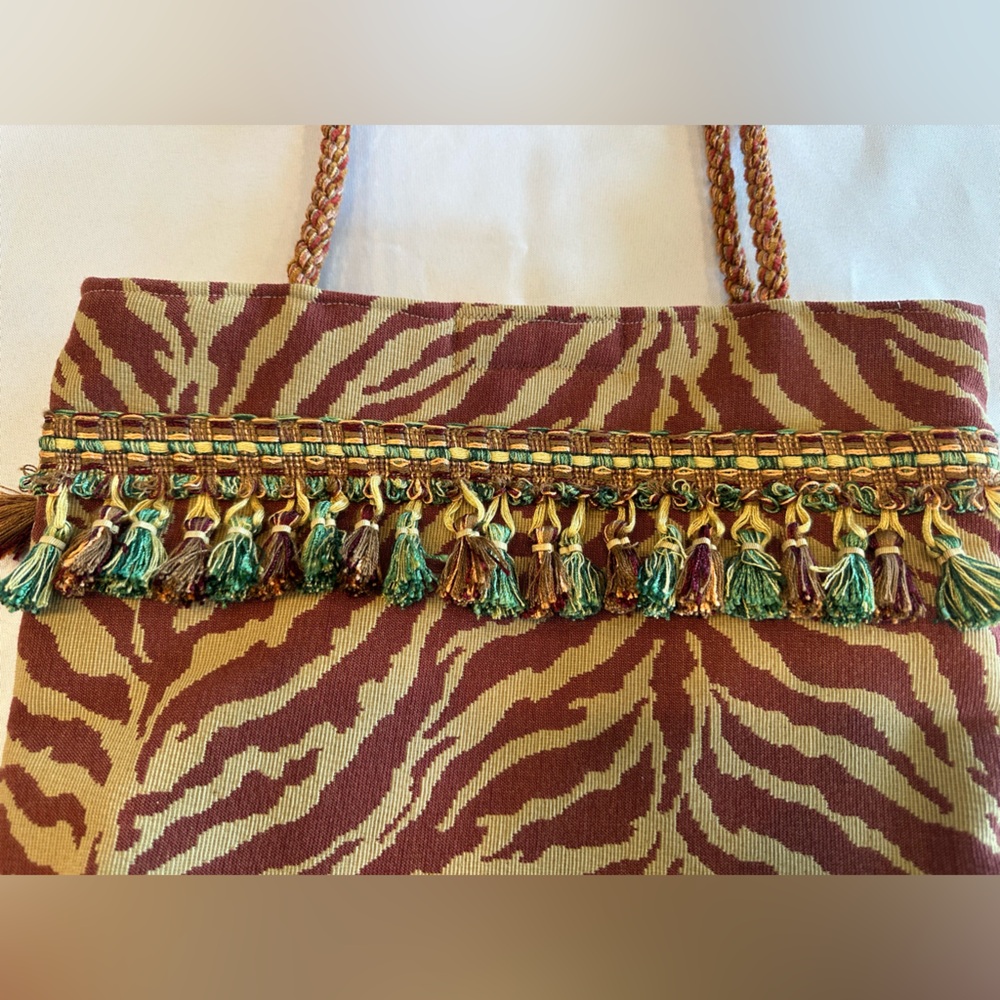 Stylish Maroon and Tan Zebra Tote Bag with Tassel Detail - Picture 3 of 10